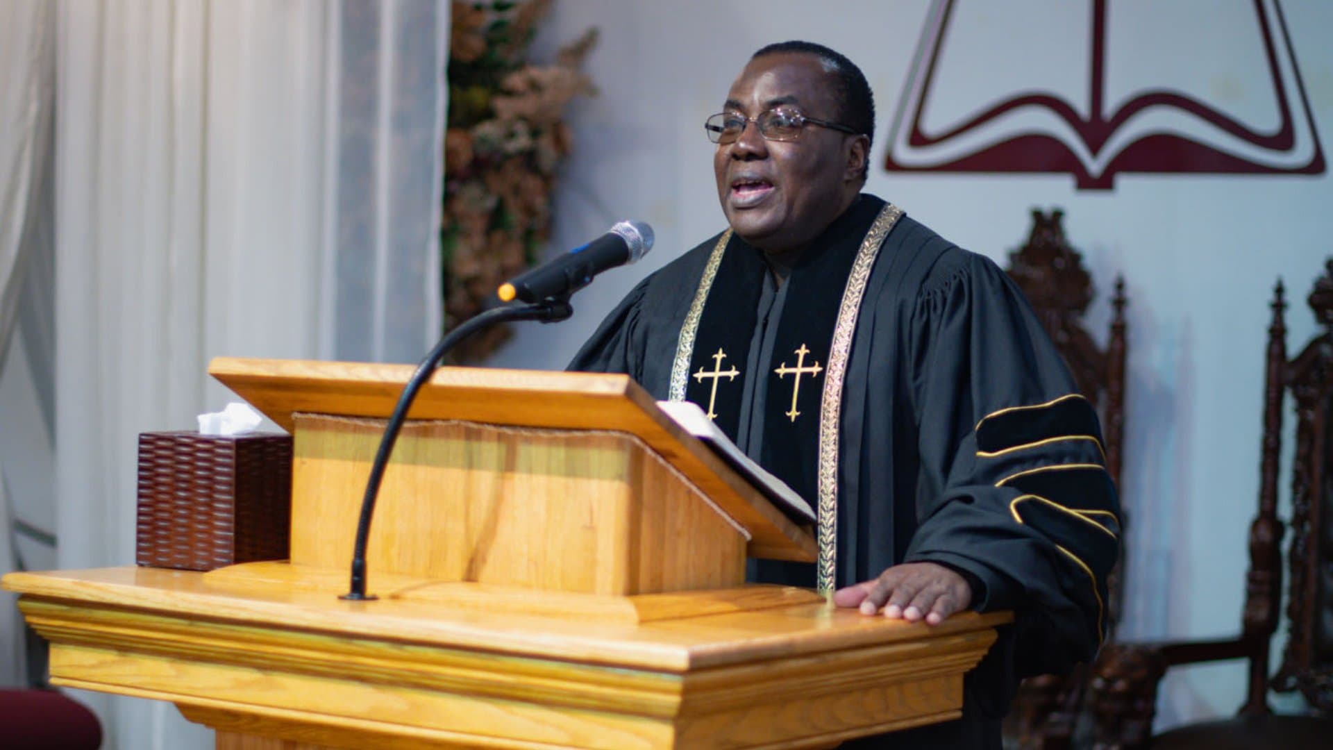 Dr. Louis M. St. Fort preaching at New Birth Christian Church